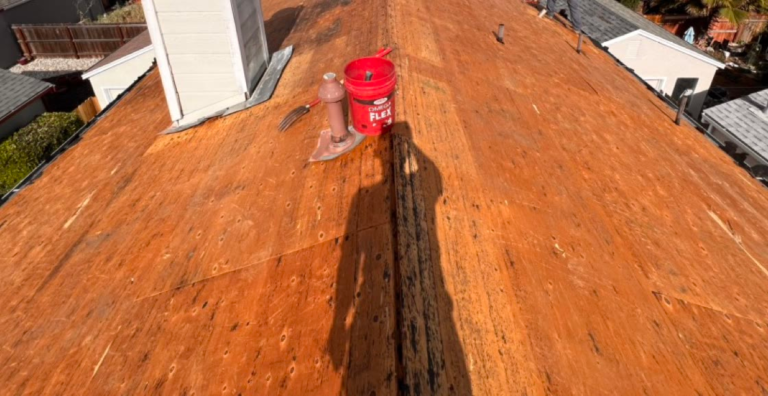 Roof deck in Elk Grove after tear-off and dry rot replacement, ready for new shingles