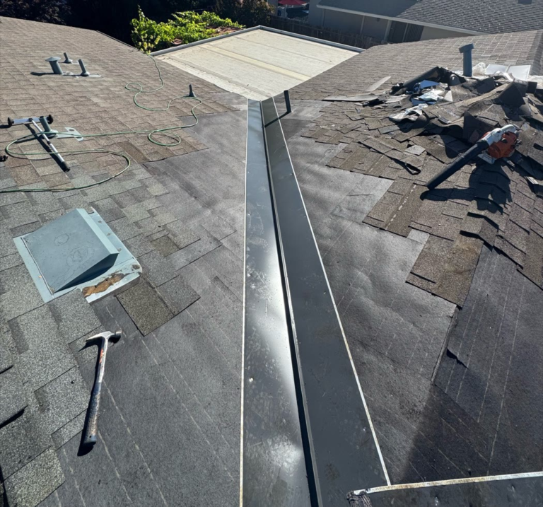 New underlayment and metal valley flashing during a shingle roof valley repair in Elk Grove