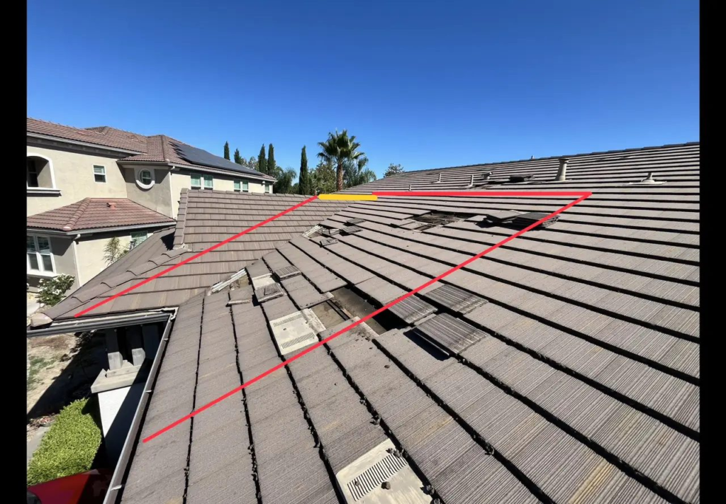 Tile roof in Roseville with the leak area outlined in red where water was backing up under the tiles