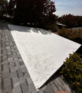 New TPO patio roof tied in to the shingle roof on a Sacramento home