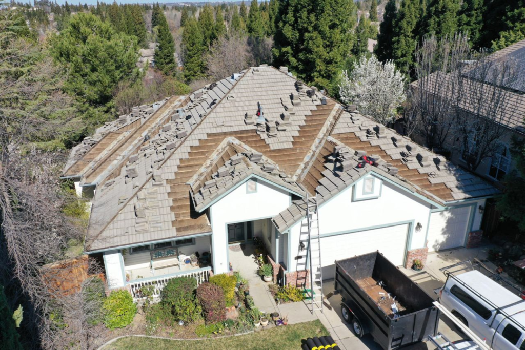 Aerial view of a tile roof during repair work