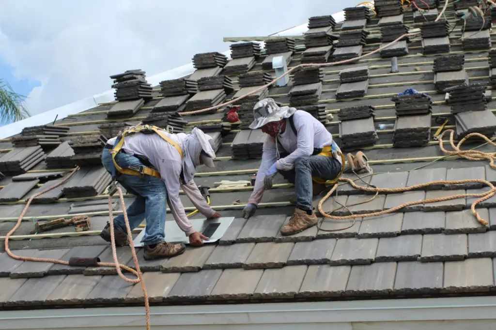 Roof Recovery crew repairing a concrete tile roof in the Sacramento area